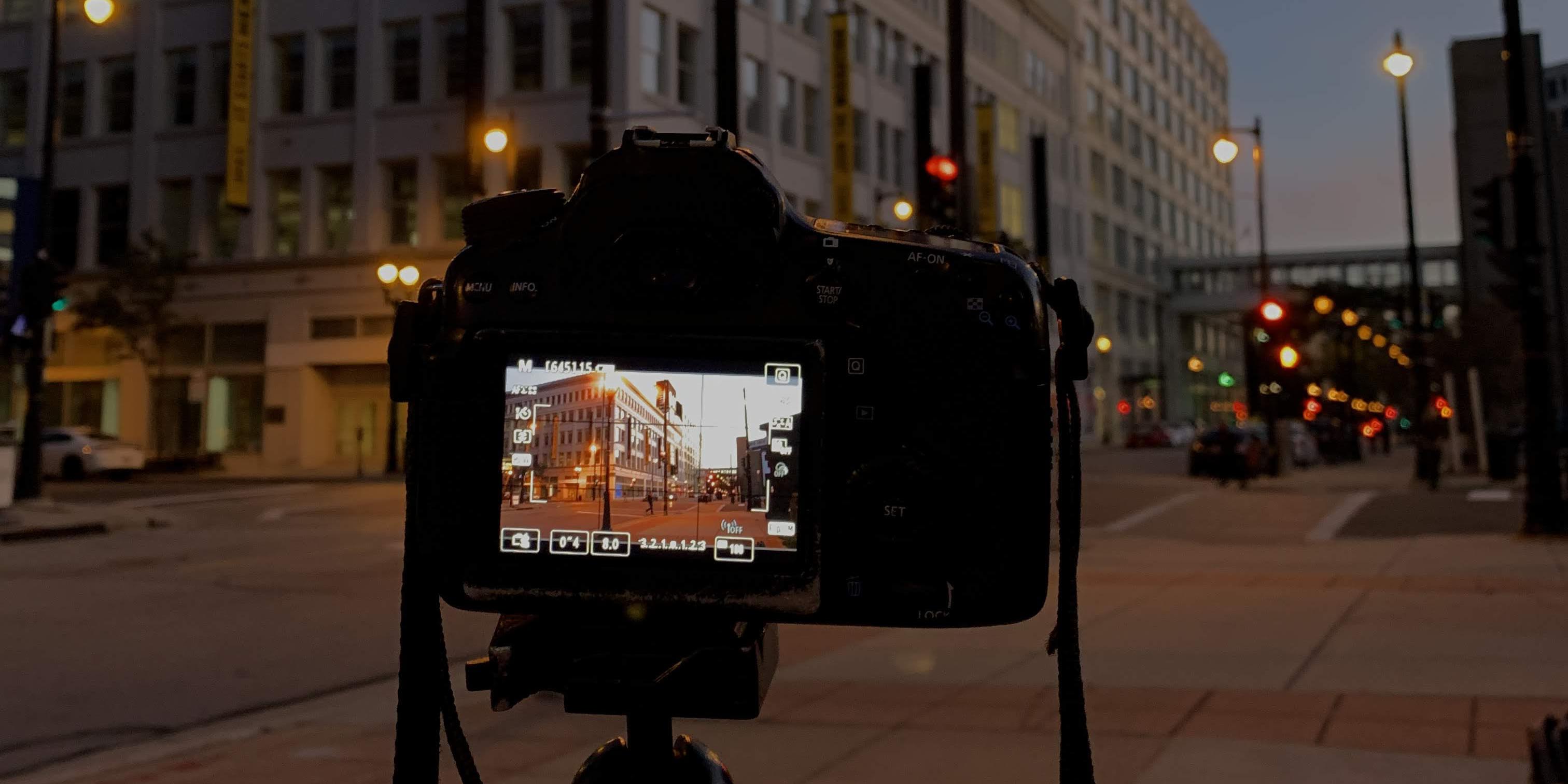 Camera taking a photo on a tripod
