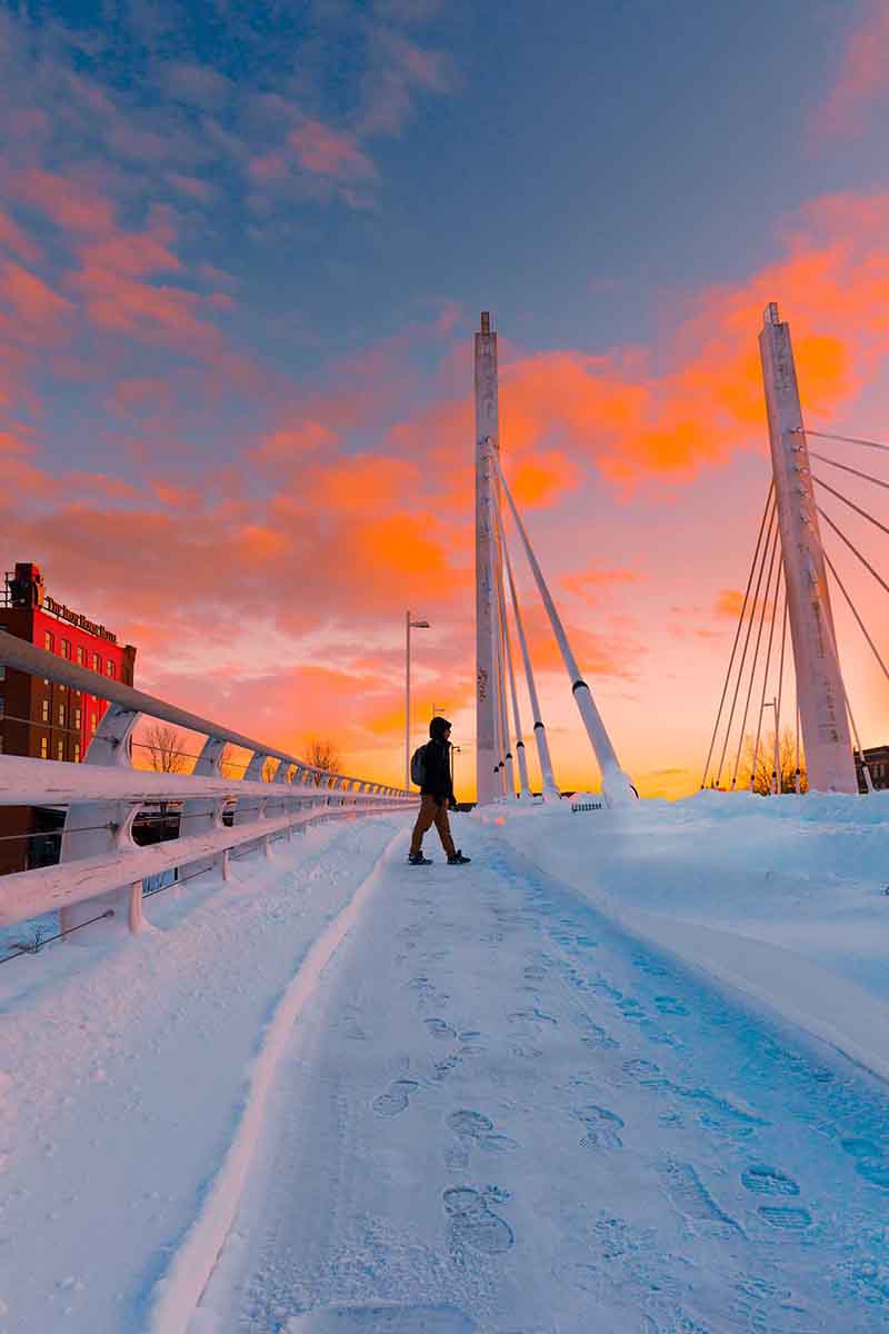person standing infront of sunset