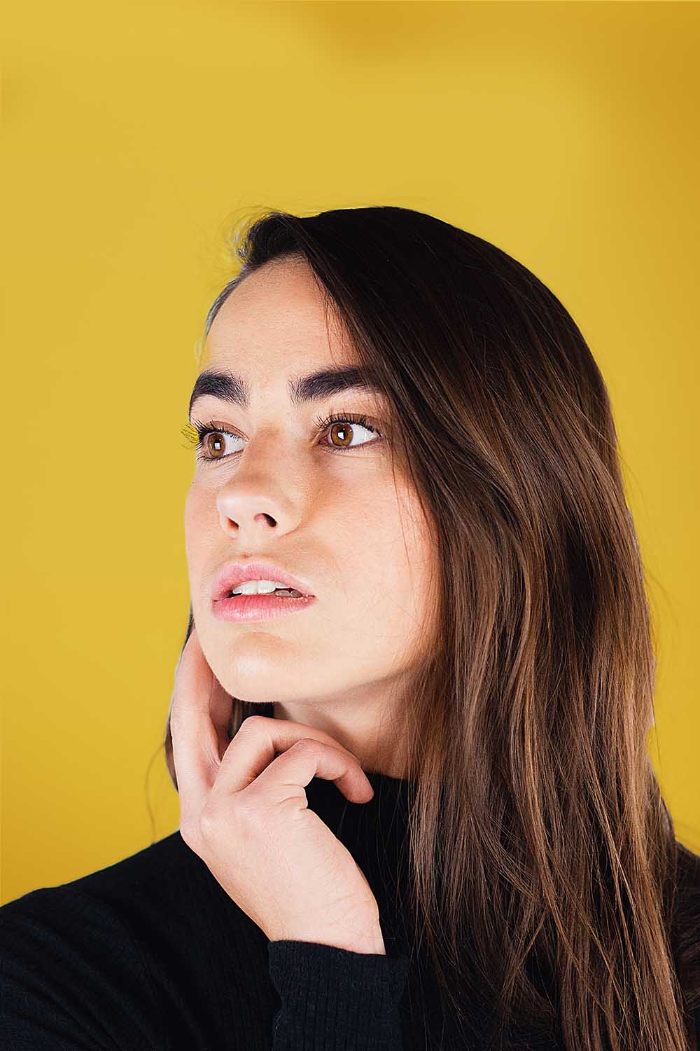 indoor model brunette gazing left photoshoot