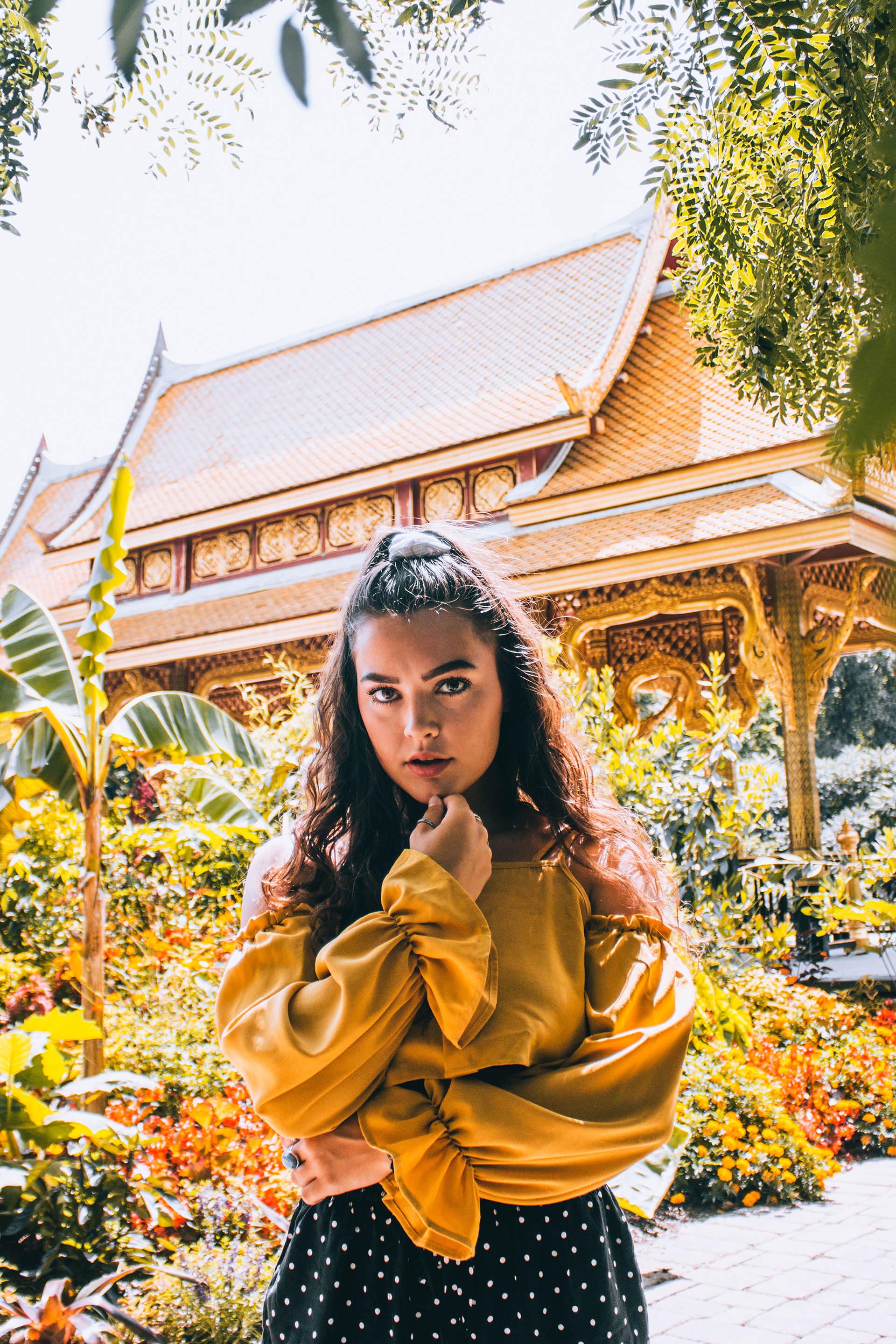 Nicole looking at photographer infront of Olbrich Temple