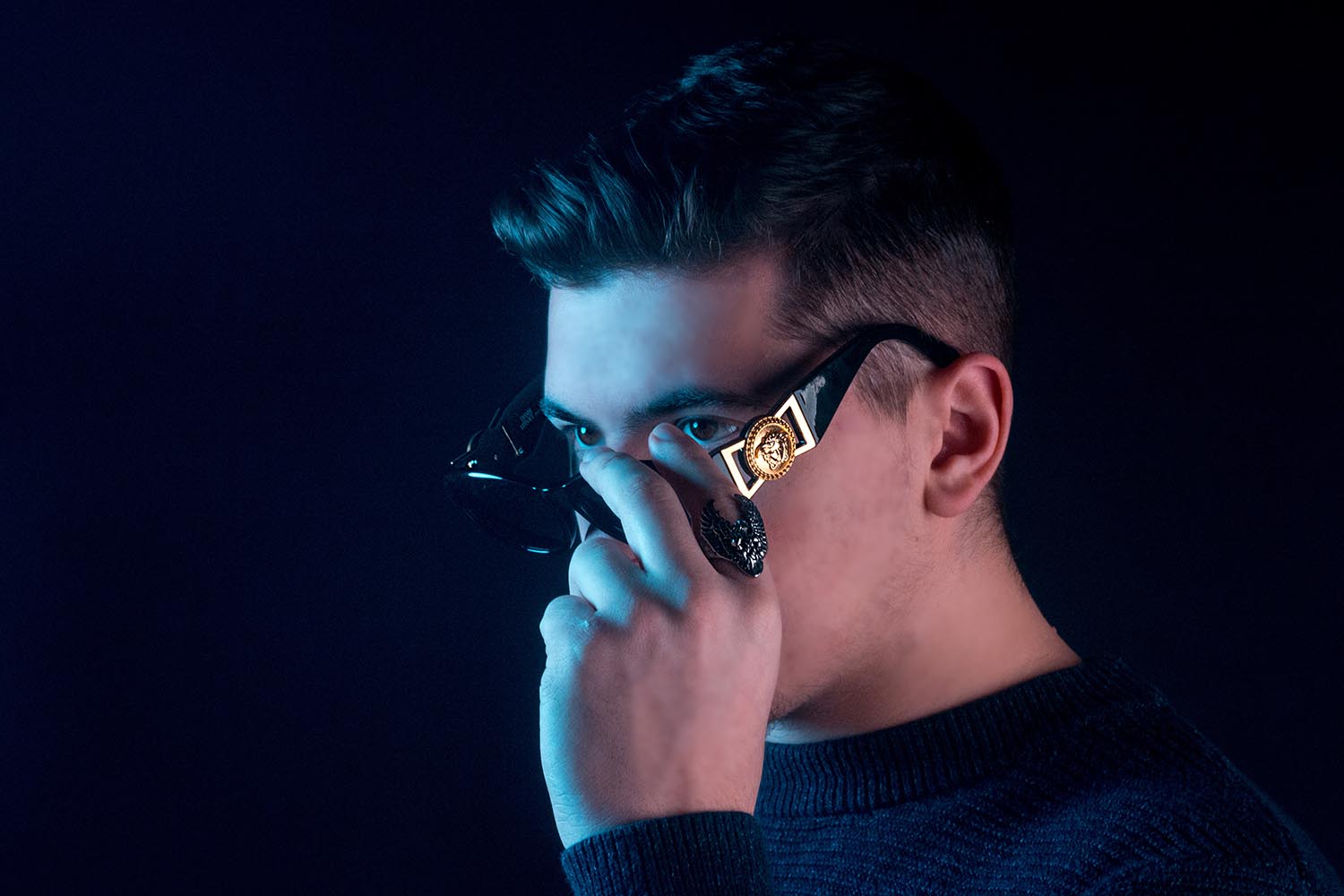 male model gazing left in studio photoshoot